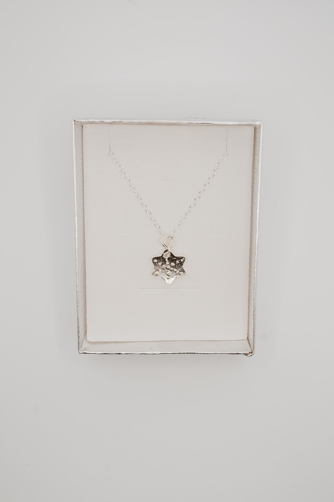 Sterling silver textured star necklace / pendant